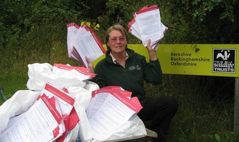 Philippa Lyons with 2,000 responses from Wildlife Trust members against the proposed HS2 route through Bucks & Oxon